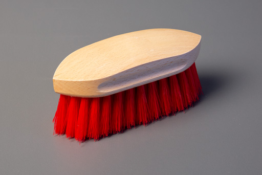 Red scrubbing brush